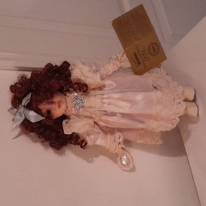 Girls handcrafted porcelain Seymour Mann Doll
